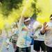Participants throw yellow powder at each other during the Ypsilanti Color Run on Saturday, May 11. Daniel Brenner I AnnArbor.com